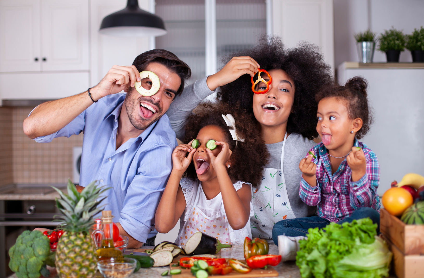 Happy family in the kitchen.
