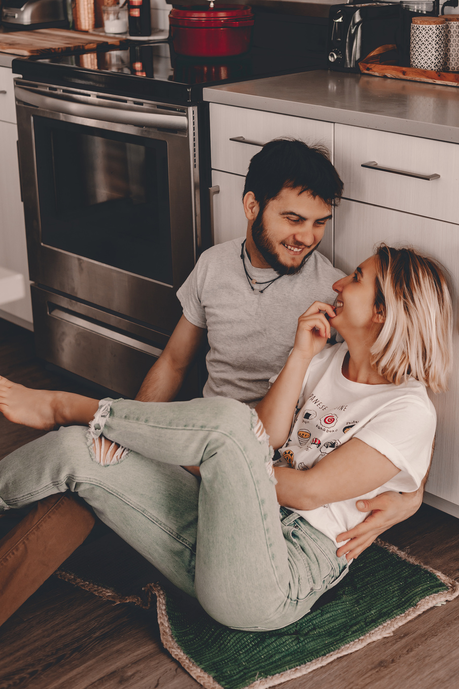 Couple Talking While Sitting on the Floor